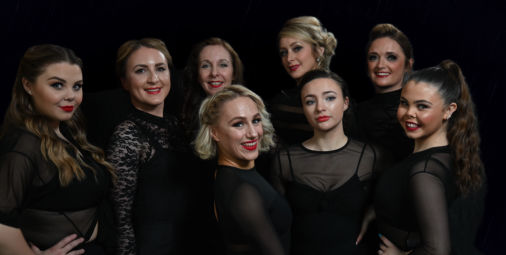 female and male dancers and actors at a rehearsal for Chicago 