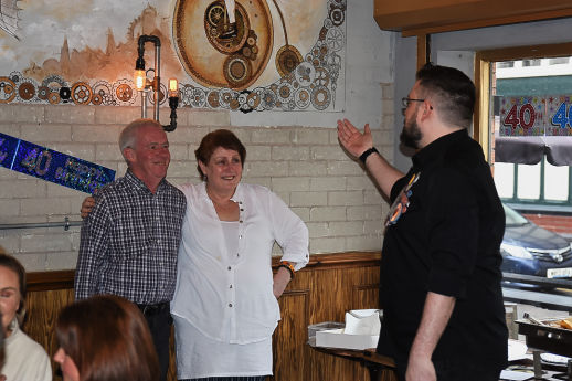 A Man celebrating his 40th with a big fat cigar