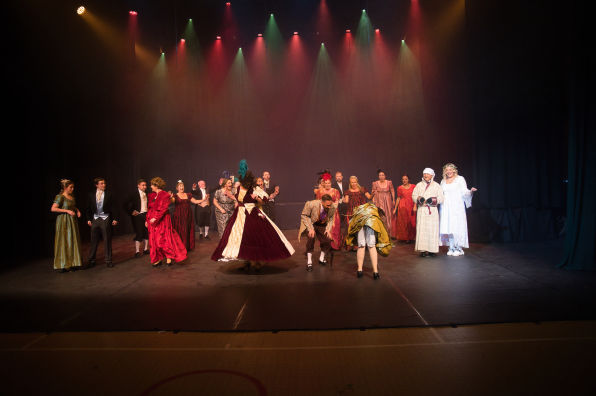 The whole cast on stage of the Christmas Carrol