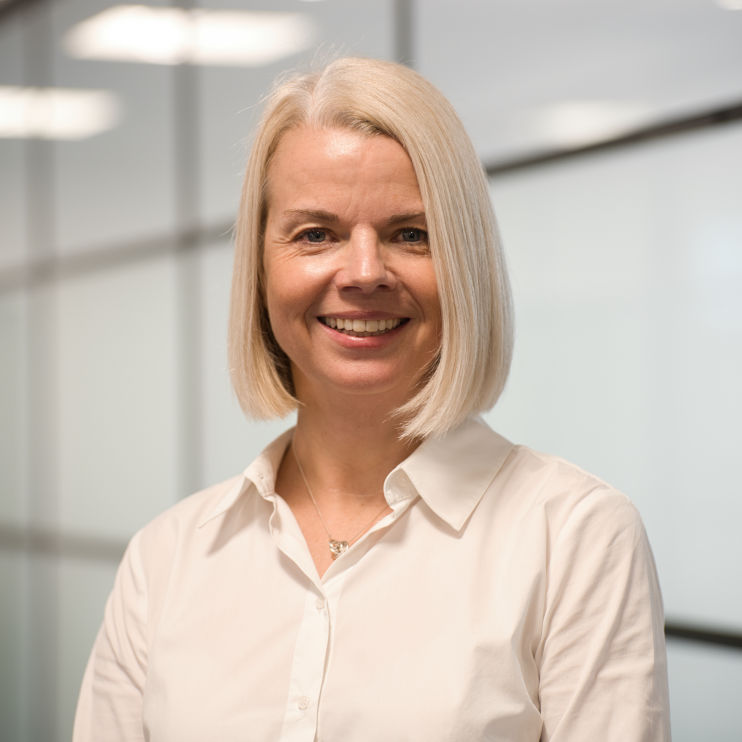 Female Corporate business manager headshot. photographed at her offices  