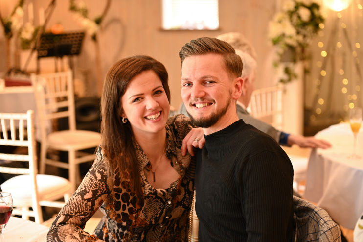 Man and women at a birthday party