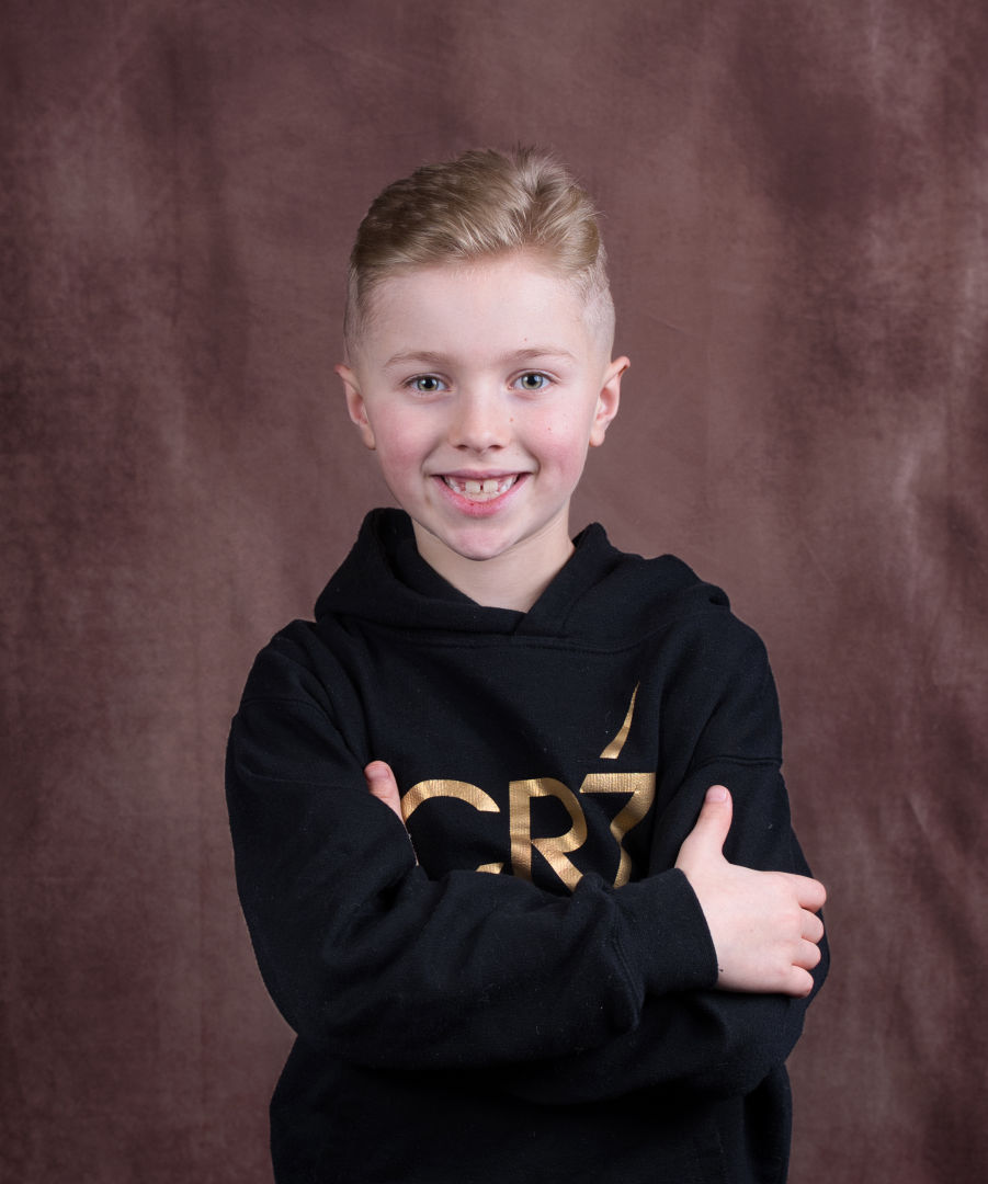 Young boy having his a portrait picture taken 